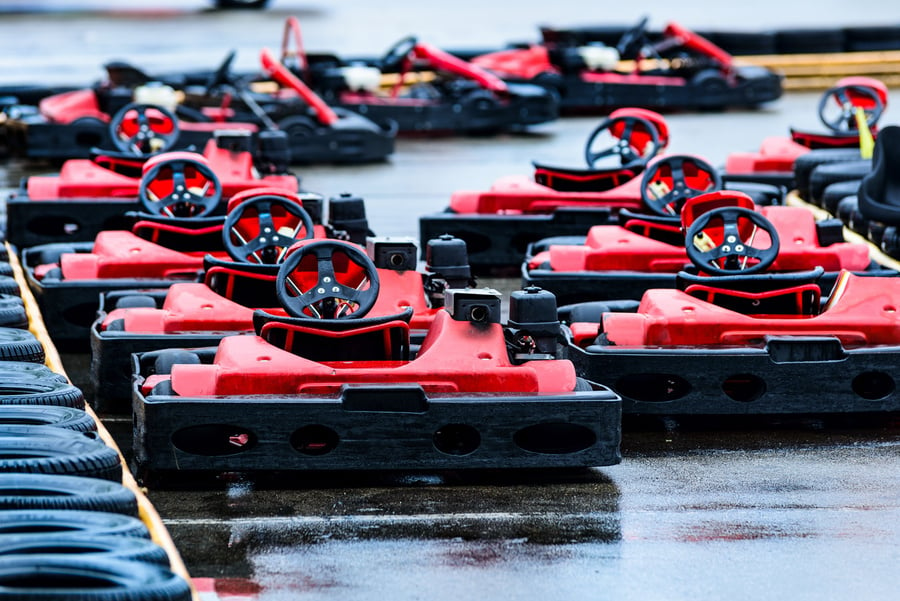 Red racing gokarts on track